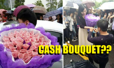 Young Man Proposed To Girlfriend With Bouquet of Cash - World Of Buzz