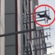 Man Survives Eight Storey Jump After His Clothes Snagged Onto Rack, Dangles Mid-Air - World Of Buzz