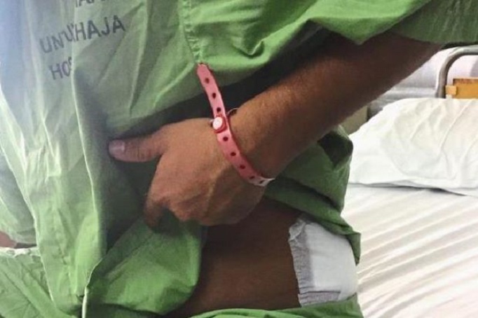 Guy Puts Himself At Harm's Way When An Armed Man Tries To Rob Store, Literally Catches A Bullet For His Colleagues's Safety - World Of Buzz