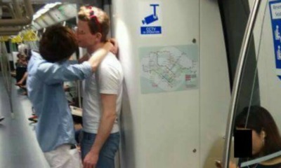 Angry Singaporean Lady Demands For 'Sex Policemen' After Witnessing Gay Men Kissing In Train - World Of Buzz