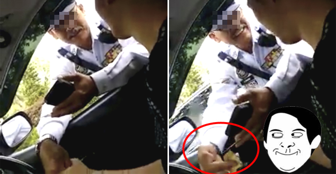 Malaysian Policeman Caught Red Handed for Accepting Bribery From Traffic Offender - World Of Buzz 2