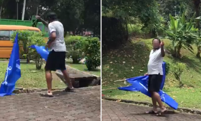 Police are Searching for 'Angry' Man Who Removed BN Flags in TTDI - WORLD OF BUZZ 3