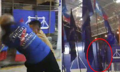 Elderly MCA Supporter Pushed Off the Stage for Allegedly Removing PKR Flags - WORLD OF BUZZ