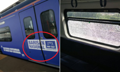 KTM Train Plastered with BN Stickers Allegedly Vandalised by Angry M'sians - WORLD OF BUZZ