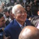 Najib Is All Smiles After Arriving at MACC's Headquarters to Give His Statement - WORLD OF BUZZ 2