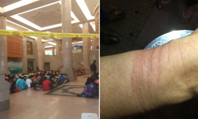 Police Handcuffed 10 Alleged Illegal Workers & Made Them Go Toilet Together - WORLD OF BUZZ