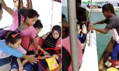 Viral Video Shows Bajau Kids Shockingly Climb onto Tourist Boat to Beg for Food - WORLD OF BUZZ