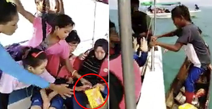 Viral Video Shows Bajau Kids Shockingly Climb onto Tourist Boat to Beg for Food - WORLD OF BUZZ