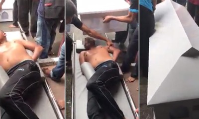 Man Tries to Break into Car in Shah Alam, Gets Caught & Put in Coffin as Punishment - WORLD OF BUZZ