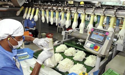 Top Glove & WRP M'sia Accused of Forcing Employees into Overtime, Withholding Pay, & Confiscating Passports - WORLD OF BUZZ 4