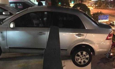 M'sian Woman's Car Almost Falls Over Multilevel Carpark After Wrongly Shift Into Reverse - WORLD OF BUZZ