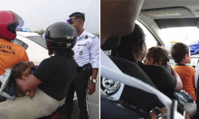Orang Asli Family With Two Kids Ride Motorcycle In Rain, Policemen Stop By To Fetch Them - WORLD OF BUZZ