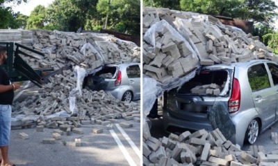 Lorry's Stalled Engine Causes Heavy Load Of Bricks to Fall on Passing Perodua Myvi - WORLD OF BUZZ