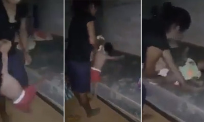 [VIDEO] Woman Violently Beats, Slaps, Pounds & Strangles Baby Girl While Changing Her Diaper - WORLD OF BUZZ