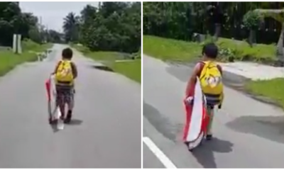 Watch: Little Boy's Failed Attempt To Run Away From Home, Gives The Grouchiest Face Ever - WORLD OF BUZZ