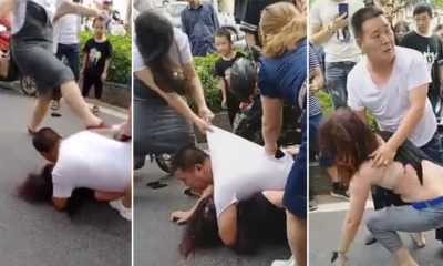 Watch: Man Lies on Top of Mistress to Protect Her From His Wife's Kicks & Punches - WORLD OF BUZZ