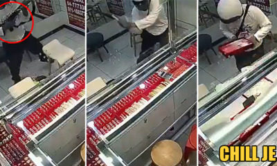 Watch: Robber Casually Walks Into Jewellery Shop, Takes Out Rifle  & Starts Whacking Glass With Axe - WORLD OF BUZZ