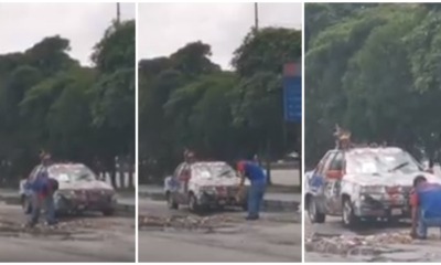 Johor Man Fed Up With Road Conditions, Fills Up Pothole Himself - WORLD OF BUZZ 1