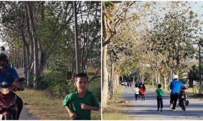 Loving Father Rides His Motorbike Alongside Tired Son To Support Him During Cross Country Run - WORLD OF BUZZ 3