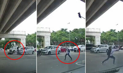 Watch: M'sian Motorcyclist Gets Hit After Beating Red Light, Immediately Gets Up to Bersilat - WORLD OF BUZZ