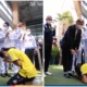 thai taekwondo athlete kneeling before her father with her gold medal 4