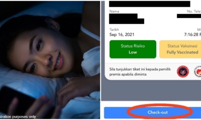 woman in bed check out my sejahtera