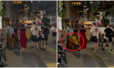 foreigner flip sign towards child