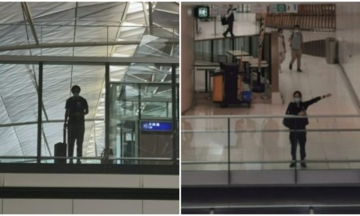 long distance couple wave to each other in airport