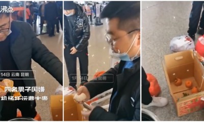 travellers in china eat oranges to not pay for luggage fees 1