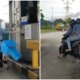 motorcyclist pay toll