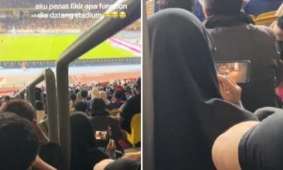 feat image woman go stadium see movie