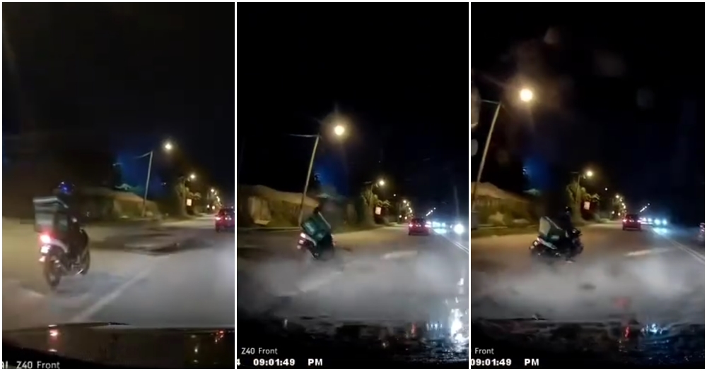motorcyclist hits pothole